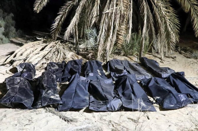 Nearly 50 bodies found in Libya mass graves amid reports of migrant abuse